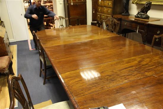 A large William IV and later mahogany five pillar extending dining table, 21ft 10in. x 5ft 2.5in. x 2ft 5in.